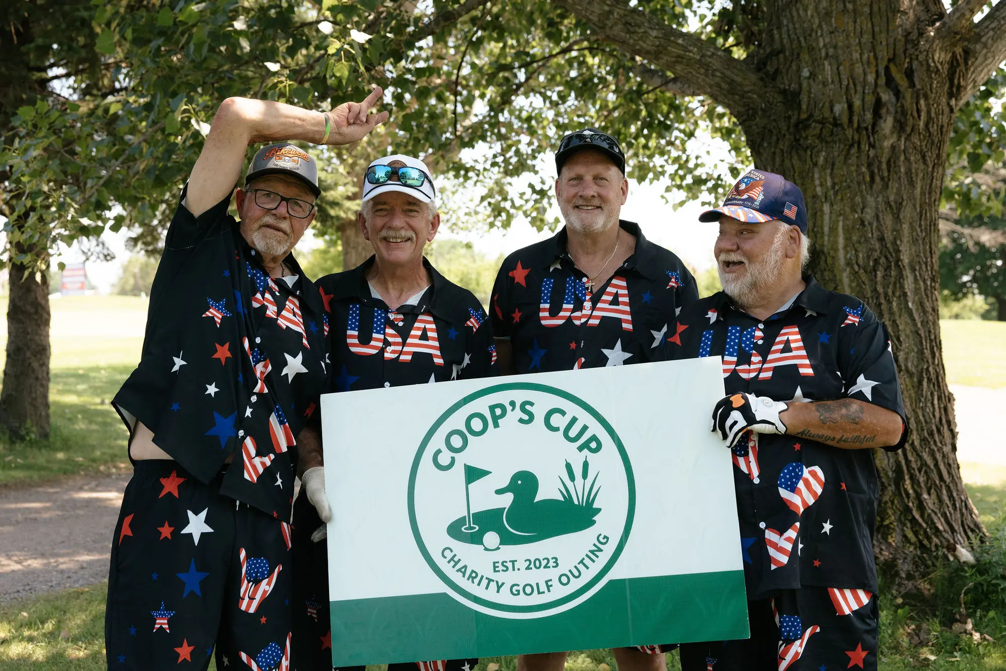 A team in patriotic outfits joins the fun
