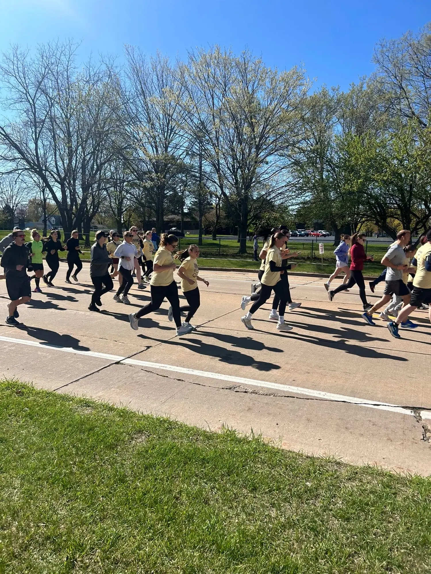 Community members walking at the NAMI Oshkosh 5K